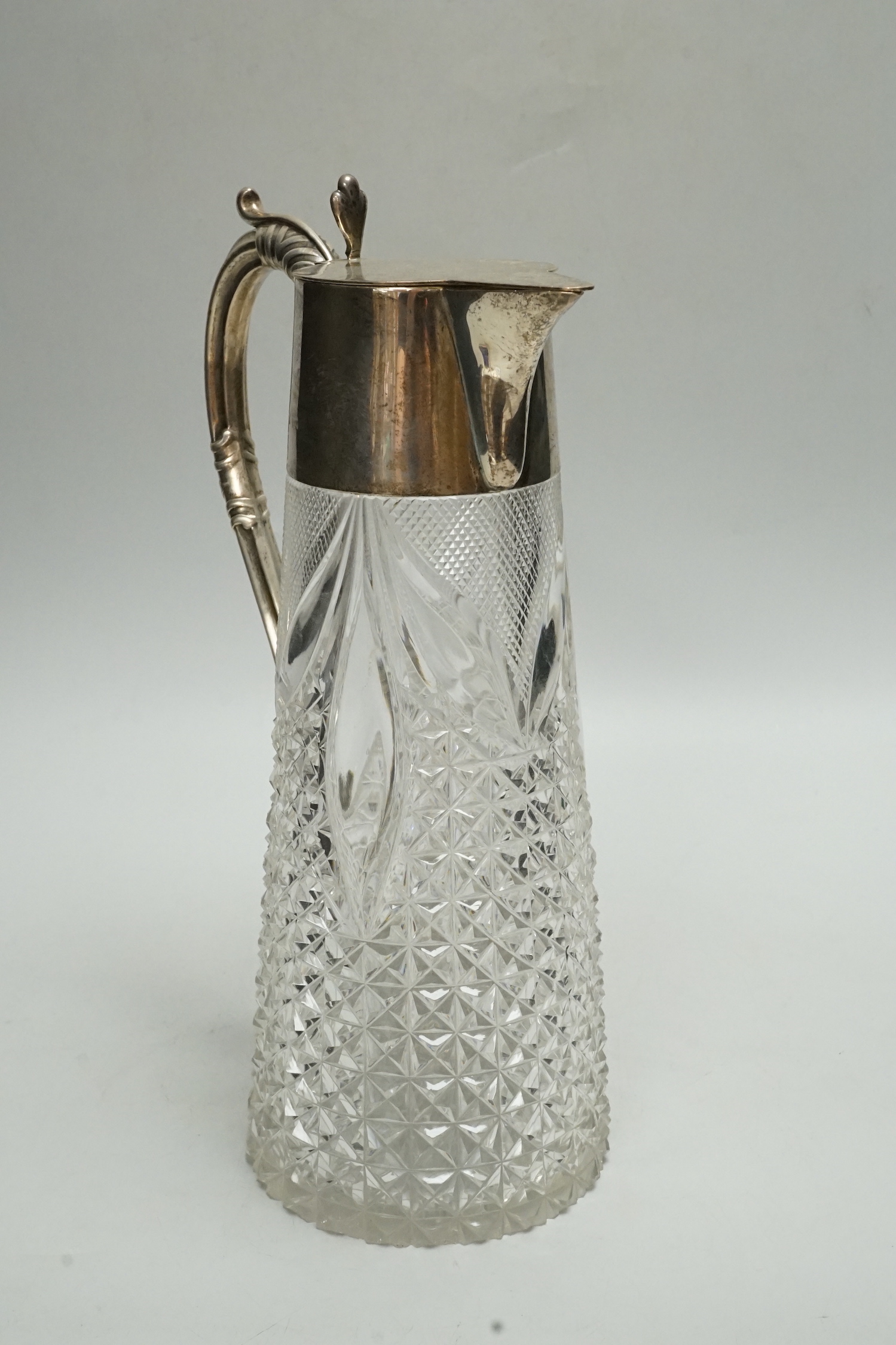 An Edwardian silver mounted cut glass claret jug, WHS, Birmingham, 1901, 26cm.